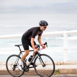 SKINS Cycle Compression Love Cats X-Light Short Sleeve Jersey Women - Black/Cosmo -Skins 233695 09 d 451376